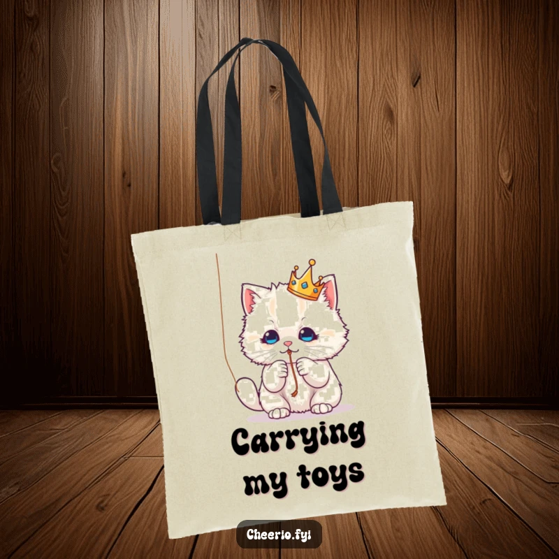 Funny Tote Bag: A crowned fluffy cat batting at a string, a delightful and humorous accessory for carrying daily items.